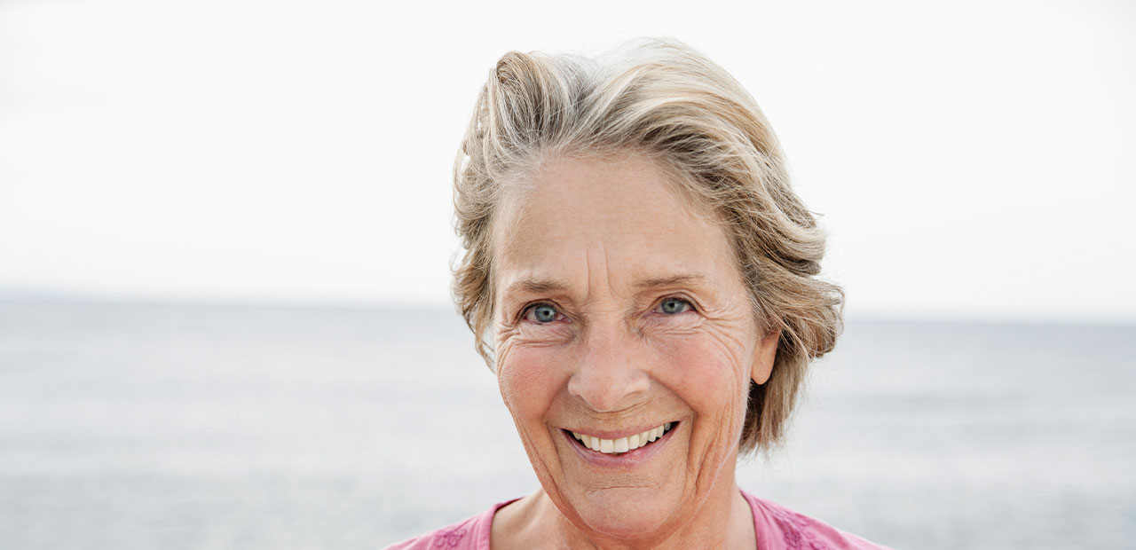 a close-up of a woman smiling