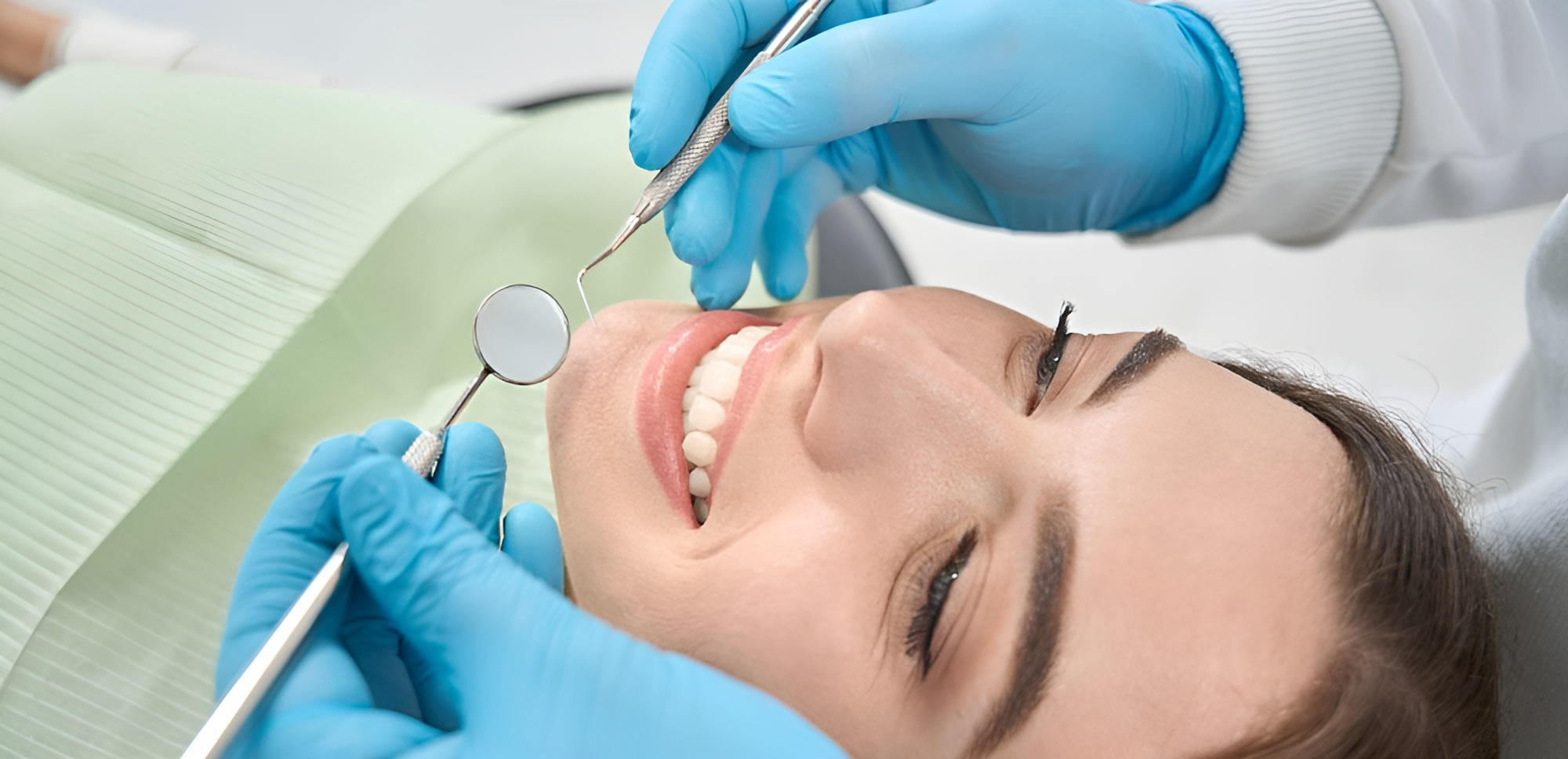 a woman getting her teeth checked